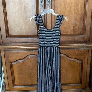 Adorable jumpsuit black white size xs with ruffle detail
